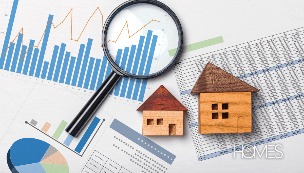 The workspace of a real estate agent, surrounded by notes and property listings. The desktop shows a charts, graphs, and calculators, indicating the agent is refining their marketing budget. This image represents the agent’s efforts to promote their brand and listings through cost-effective marketing strategies, as discussed in the article.