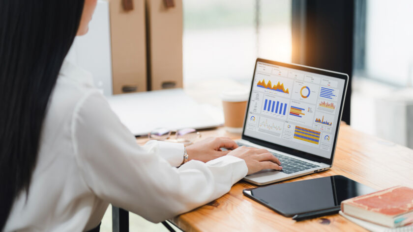 Real estate social media ads for realtors dashboard review in a modern office